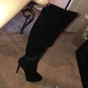 Jennifer Lopez Thigh High black leather boots